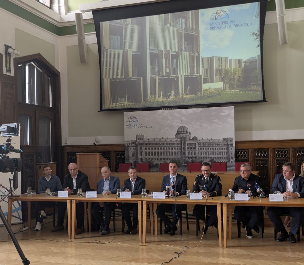 A panel of experts and government officials at the Ministry of Industry and Trade (MPO) in Prague, presenting the new fire safety regulations for timber buildings in the Czech Republic.